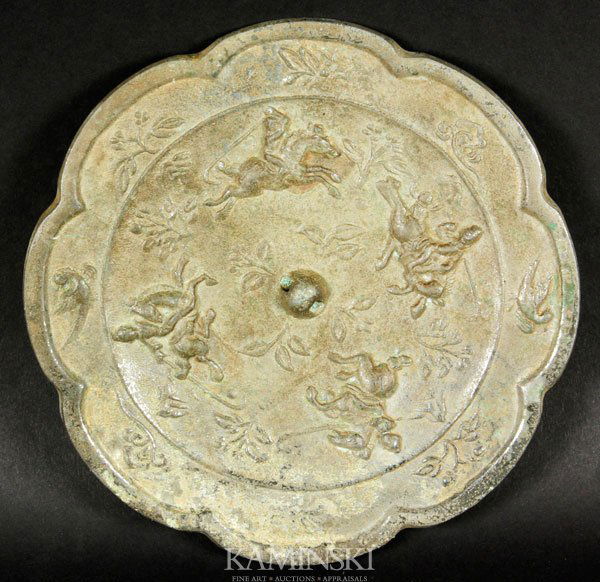 Bronze Mirror: Mirror, bronze, petaled form, with horses and rider on reverse, 6".