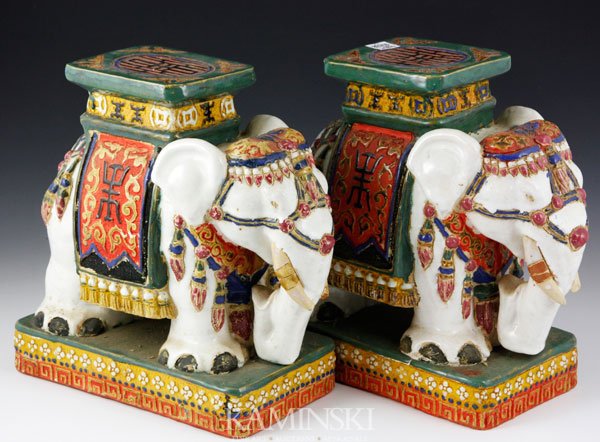 Pair of Chinese Pottery Elephants: Pair of pottery elephants, China, glazed with wucai palette, 13” x 6 1/2”.