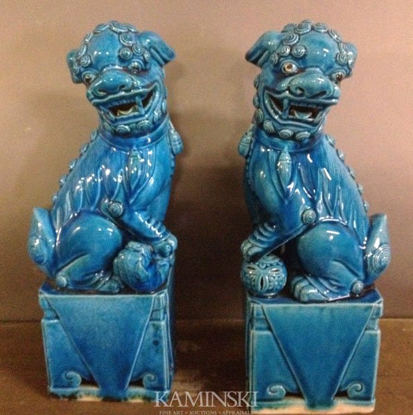 Pair of Chinese Foo Dogs: Pair of foo dogs, China, Republic period, on square bases, old red and white label on base, 12" x 4" x 2 3/4".