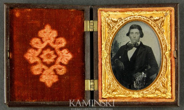 Ambrotype of Young Man: Ambrotype, 1/9 plate, image of a young man, contained in scare brown thermoplastic case, Profile of Liberty, case maker, Holms Boother & Hayden. 3"h x 2 9/16"w.