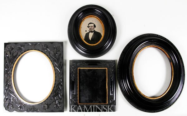 4 Wall Frames: Lot of four wall frames, 1/4 plate oval thermoplastic frame, contained a spotted ambrotype of a gentleman, 7 1/2"h x 9"w, ornate floral thermoplastic frame, no image, 7"h x 8"w, full plate thermoplast