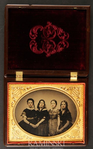 Ambrotype of 4 Girls: Ambrotype, half plate, image of four girls, contained in a scarce Geometric and Scroll thermoplastic case by Peck & Halverson, 6 1/4" x 5 3/16'. Chip on right corner.