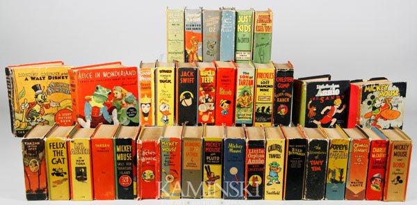 36 Early Big Little Books: Lot of thirty-six early Big Little books, including Mickey Mouse by Walt Disney, Tarzan by Edgar Rice Burroughs, and comic characters. Shelf wear.