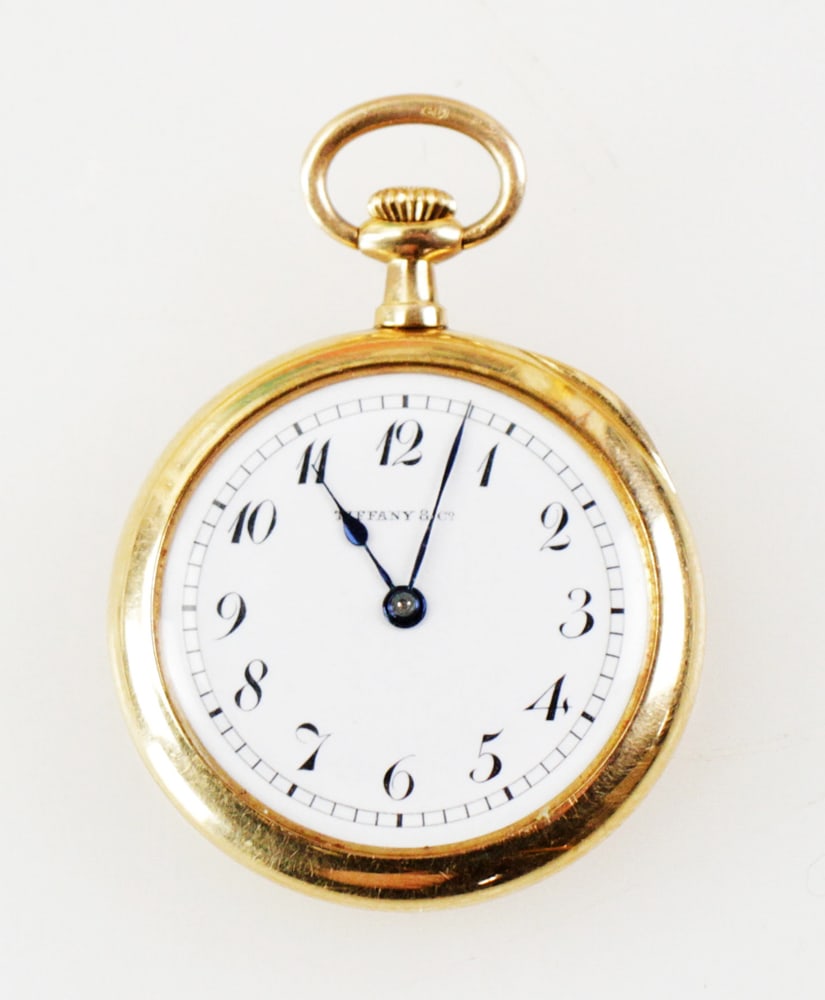Tiffany & Co. 14k Yellow Gold Pocket Watch: Tiffany & Co. 14k yellow gold pocket watch, marked Tiffany & Co. on face, case, and movement, dated 1908 with inscription on inside of case, 1" diameter. Approximately 19 grams (including movement). R