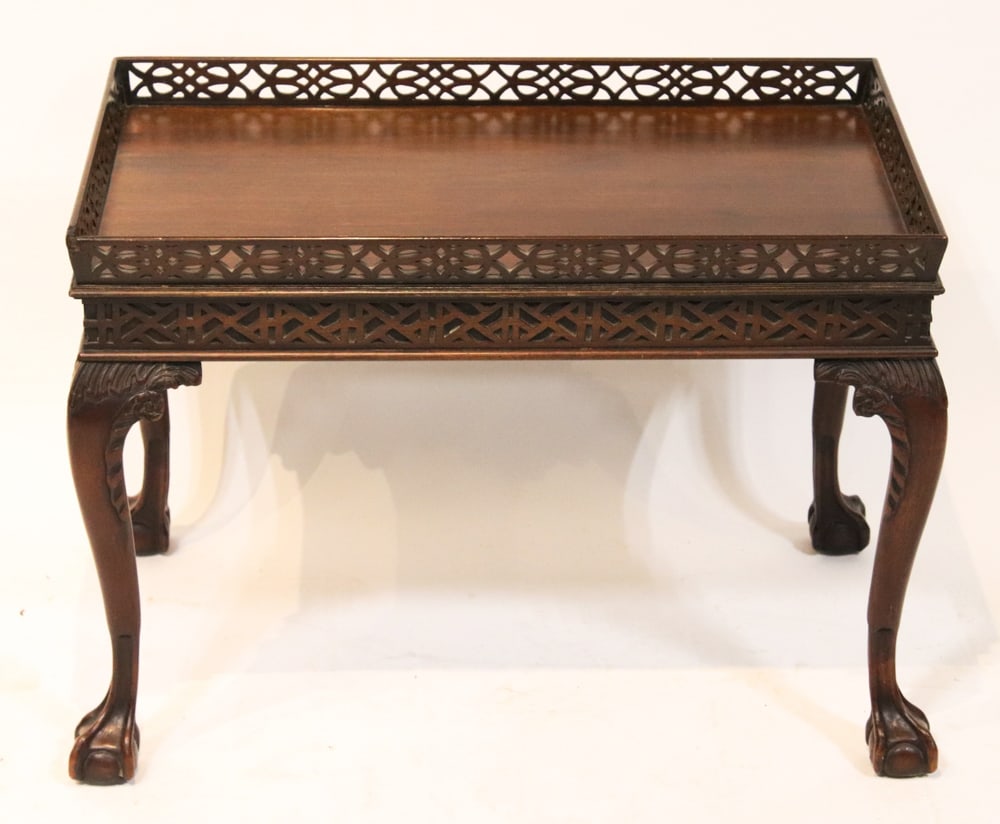 18th C. George III Style Chippendale Mahogany Side Table: 18th century George III style Thomas Chippendale mahogany side table, finely decorated with a fretted tray gallery, above blind fretwork aprons and raised on cabriole legs terminating in ball-and-claw