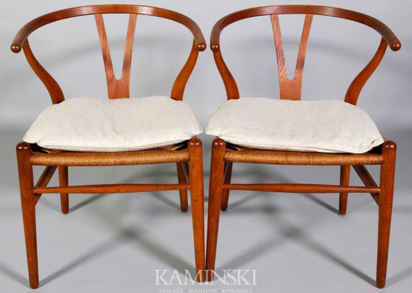 Hans Wegner, 2 "Wishbone" Armchairs: Hans Wegner, Lot of two "Wishbone" Armchairs, circa early 1960's, branded mark (reads facing in) "Made in Denmark, By Carl Hansen and Son, Odense Denmark" in pencil KH, one with impressed 1, one with