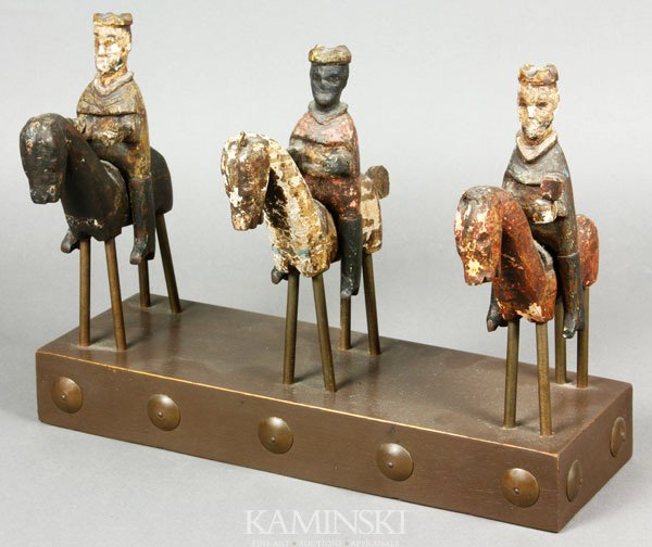 3 Wise Men Wooden Figures: Three wise men, antique wooden figures on horses, mounted later to decorative base, circa 1960's, age of figures unknown, 7"h x 10"w x 3 1/4"d. Some old losses to figures.