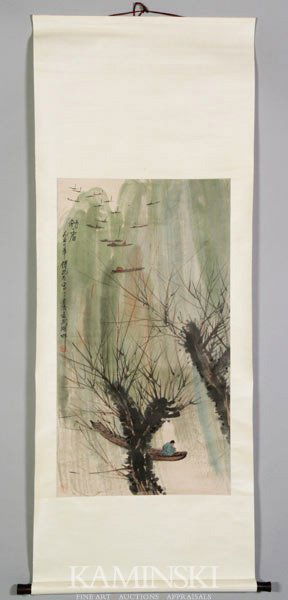 Chinese Scroll Painting: Scroll painting, China, of two trees in the foreground and a figure on a boat in the background, signed Fu Baoshi.