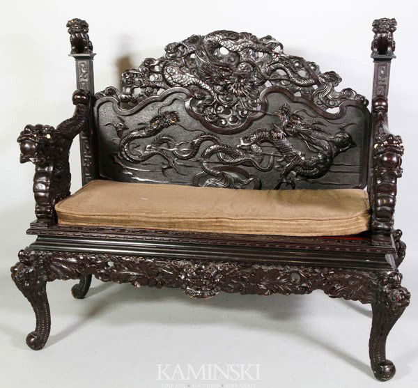 Exceptional Chinese Bench: Exceptional carved bench, China, carved with dragons on the seat back and dragon arm rests.