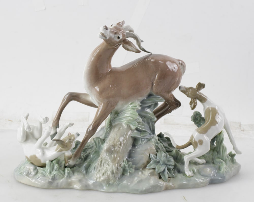 Lladro Porcelain Figurine, "Fierce Pursuit": Lladro porcelain figurine, "Fierce Pursuit", artist Salvador Furio, issued 1974, with Lladro backstamp, 13" H x 7" W. Good condition, no breaks, no box. Provenance: Boxford, Massachusetts collection.
