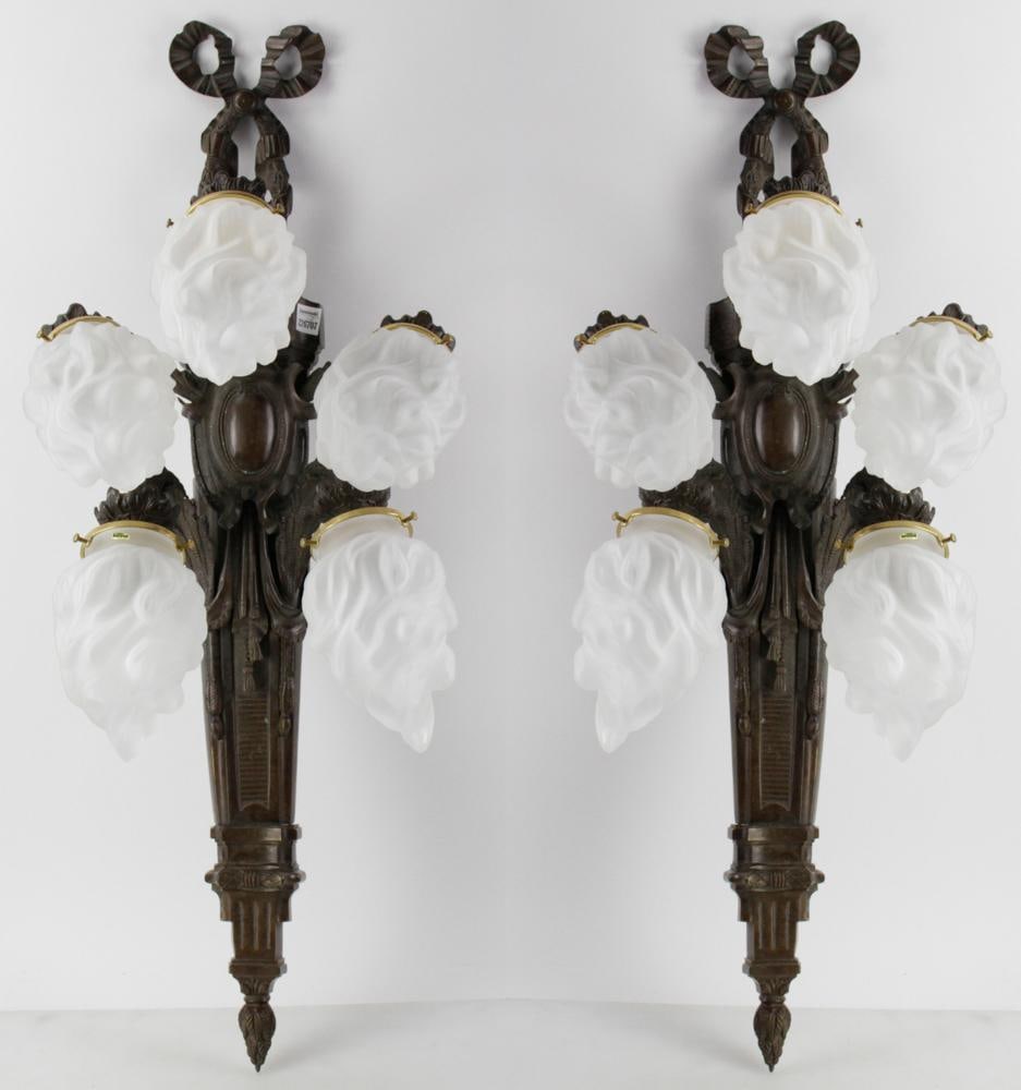 Pair of Vaudeville Era Bronze Wall Sconces: Pair of Vaudeville era bronze wall sconces, similar to the Pilgrim theater lighting, 14" x 39" x 14". Provenance: an old Massachusetts family estate.