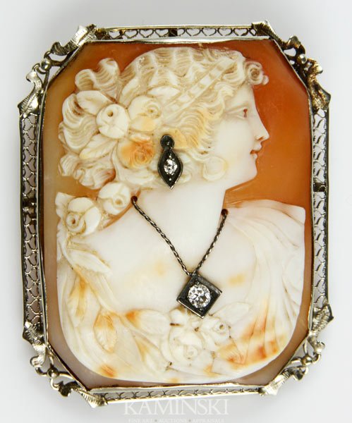 14K Gold, Diamond and Shell Cameo: 14K white gold, diamond and shell cameo brooch/pendant, approximately .10ctw of diamonds, 1 7/8"h x 1 5/8"w.