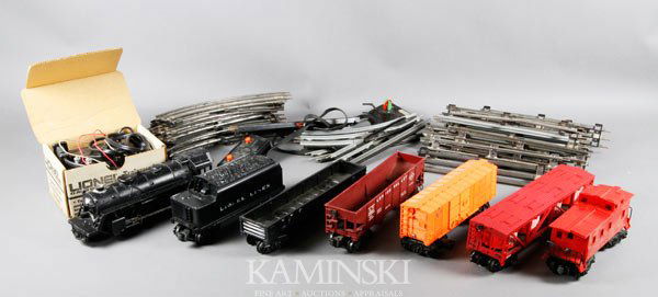 1950's Lionel Train Set: Lionel train set, circa 1950's, includes engine, six cars, tracks, and transformer.