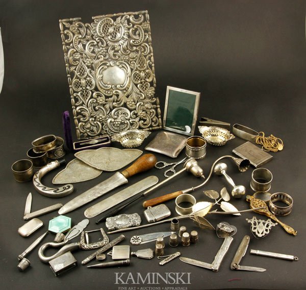 Miscellaneous Silver Items: Miscellaneous silver lot, to include: book cover, gilt lorgnette, gilt chain, compacts, thimbles, page turner, guilloche enamel compact, snuffers, pocket knives, faux dagger with wooden handle, etc., 