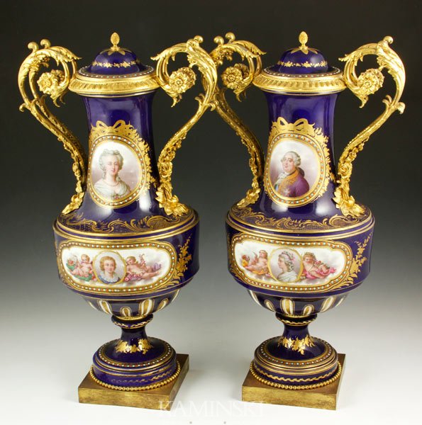 19th C. French Pair Sevres Urns: 19th century, French, pair of exceptional sevres urns, hand-painted with ormolu handles and trim, 22"h x 12"w.