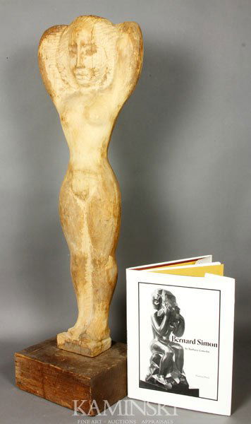 Simon Carved Figure of Woman: Bernard Simon, carved figure of a woman, wood, on base, lot includes book bout the artist, 32"h. Provenance: From the estate of Bernard Simon.
