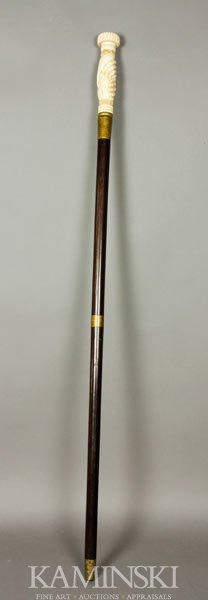 Ivory Handled Cane: Carved ivory handle cane, of clasped hands, screw top with cognac bottle inside, cane is collapsible, 36 1/8"l.