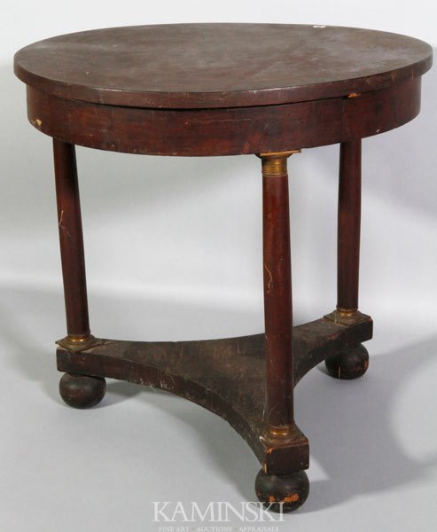 19th C. Mahogany Gueridon Table: 19th century, Gueridon table, mahogany having tapered columns, bronze caps and bunned feet, 30"d x 29 1/2"h.