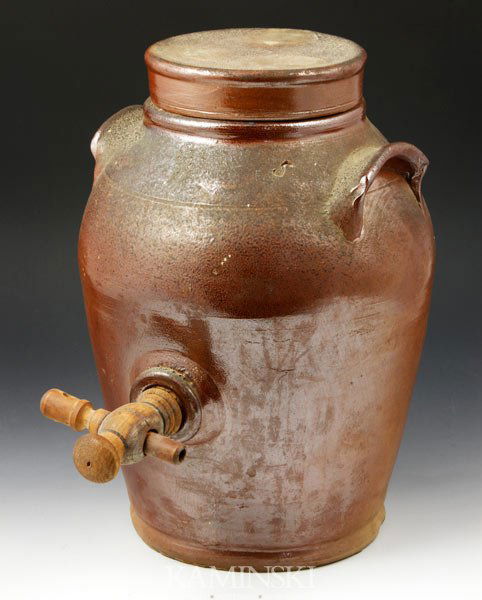 19th C. English Redware Water Dispenser: 19th century, English redware water dispenser, with wooden spigot, covered, applied handles, 11 1/2"h.