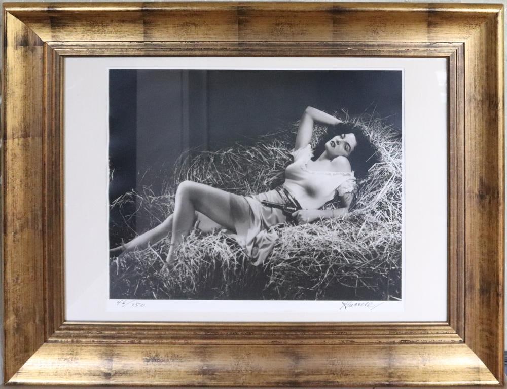 George Hurrell, Photo of Actress Jane Russell: George Hurrell (American, 1904-1992), photo of actress Jane Russell for "The Outlaw", silver gelatin emulsion, from an edition of 250, signed and numbered in ink along lower margin, 16" x 19 1/2" (sig