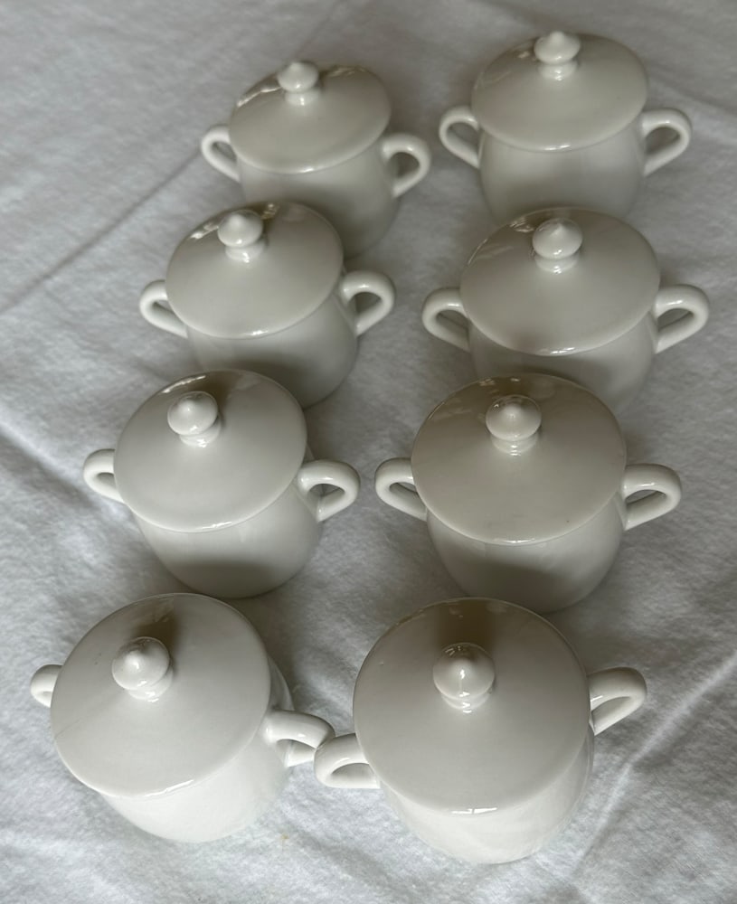 Group of French Porcelain Covered Chocolate Pots: Group of (8) French porcelain covered chocolate pots, 2" x 3 1/2" x 3".