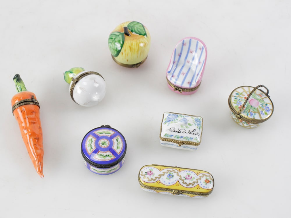 Group of Limoges Hand-painted Boxes: Group of (8) Limoges hand-painted boxes, including basket, tooth box, radish, carrot, chair, peach, round, and oblong. Provenance: Arvada, Colorado collection.