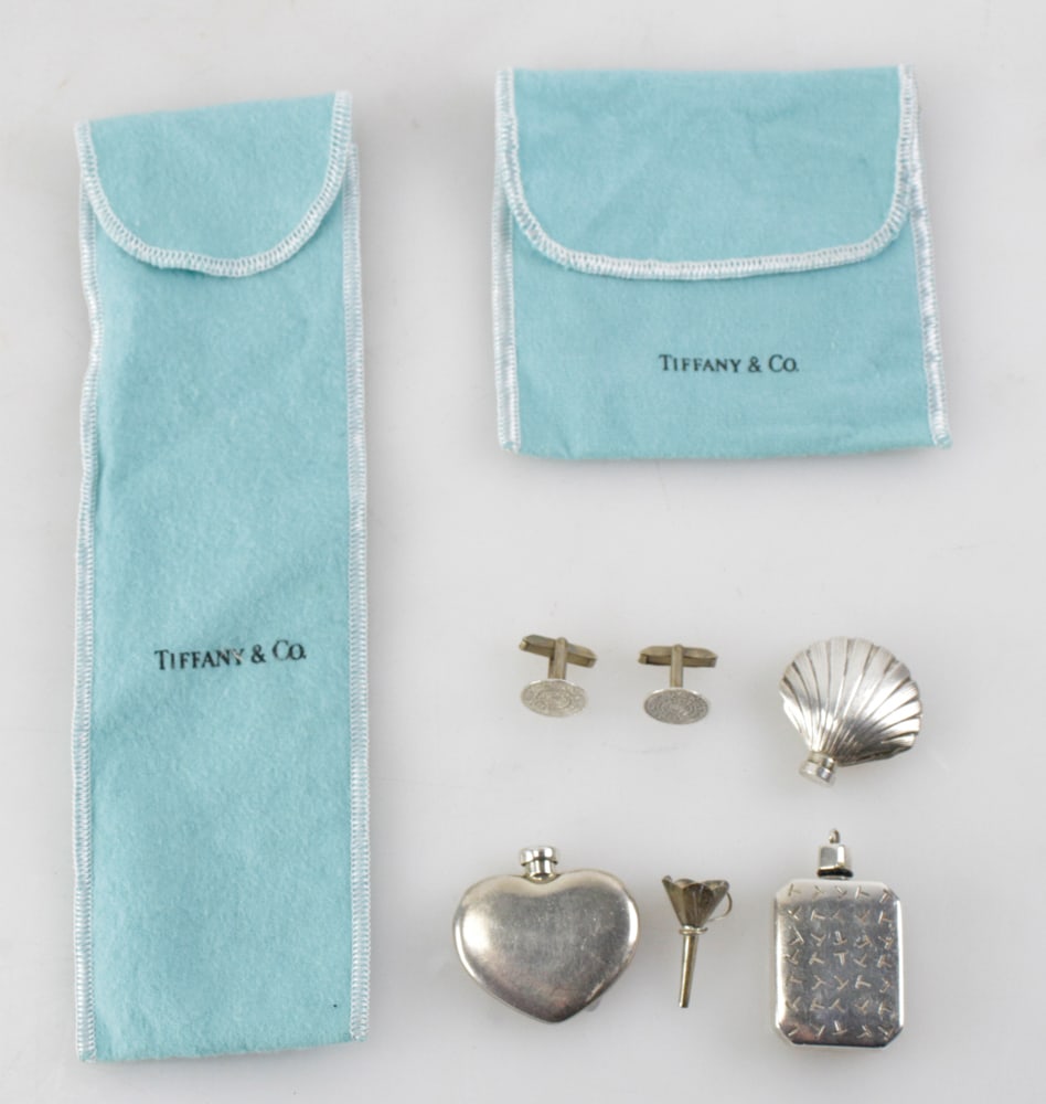 Tiffany Sterling Perfume Flasks, Funnel, Bottle, Cufflinks: Tiffany sterling perfume flasks, heart, shell, bottle, mini funnel, pair of cufflinks. Approximately 2.0 troy oz TW. Provenance: Arvada, Colorado collection.