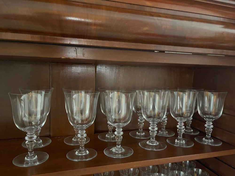 Baccarat Signed Water Glasses: Group of signed Baccarat stemmed water glasses, 7" x 3 3/4", (12) total. Provenance: Estate of Howard D. Monroe, Jr., West Palm Beach, Florida.