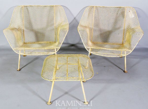 Woodard Sculptural Pair of Low Armchairs and Otto: Russell Woodard, Sculptural pair of low armchairs and ottoman, painted iron, USA 1960's, unmarked, 27 1/4"h x 32 1/4"w x 29 1/2"d (armchairs), 14 1/2"h x 20 1/2"w x 20 1/2"d, light rust.
