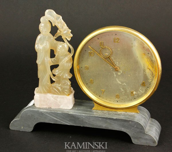 Carved Guan Yin Mounted on Clock: Agate carved Guan Yin mounted on clock, 7 1/2"h.