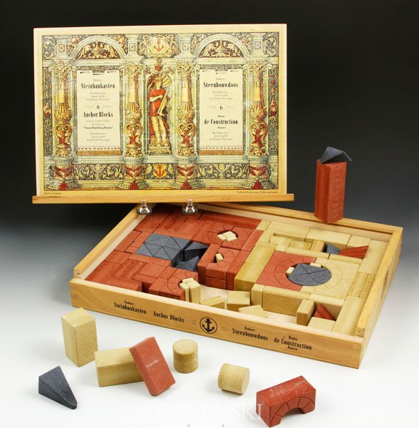 Set of German Stoneware Building Blocks: Set of German stoneware child's building blocks, Nob Anchor blocks, in modern wooden case, 8 3/4" x 11 3/4".