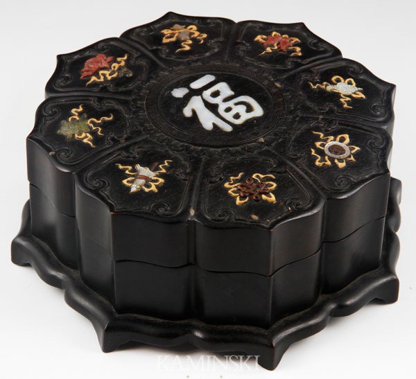 Chinese Zitan Box: Carved box, China, zitan with an inlay of mother of pearl amongst other stones, depicting the Chinese character for happiness, and the eight buddhist elements, 3 1/4" x 7 1/2".
