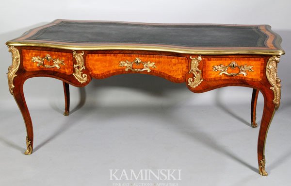 19th C. French/Italian Bureau Plat: 19th century bureau plat, probably French or Italian, inlaid with Baccus on each side and heavy ormolu, 31" h x 63 1/4" d x 32 3/4" l. Some cracking of inlay.
