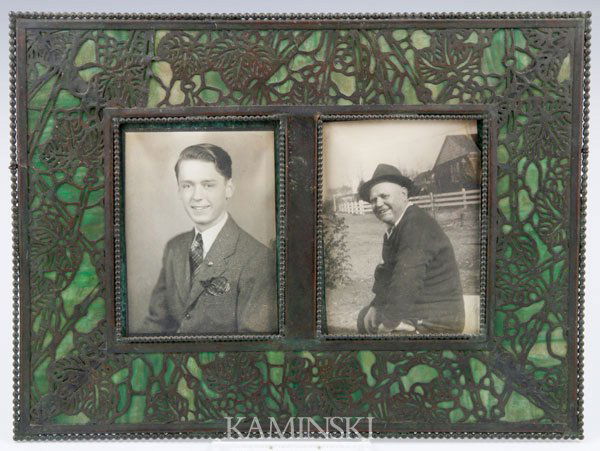 Riviere Studios Bronze Picture Frame: Riviere Studios New York double picture frame, bronze over green glass, 9 7/8" x 13 1/4". Glass cracked.