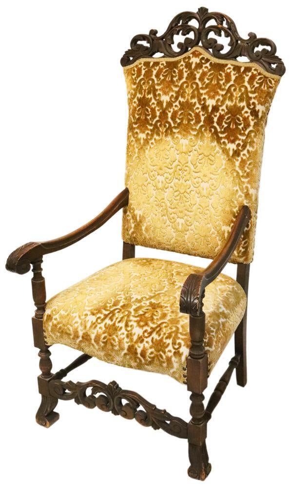 Spanish Carved Upholstered Armchair: Spanish carved upholstered armchair. Provenance: Marblehead, Massachusetts collection.