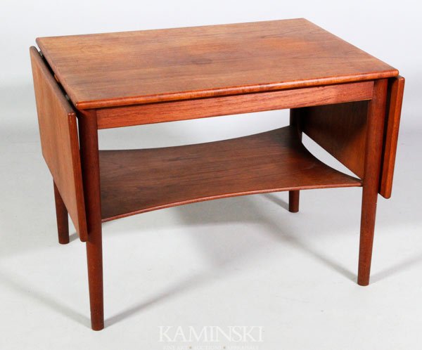 Danish Modern Side Table: Danish Modern side table with fold-up side extensions and handkerchief shaped lower shelf, branded Made in Denmark, circa 1960, 21 1/4"h x 29"w x 20"d. Some staining to top.