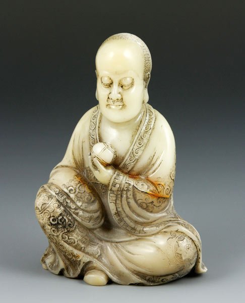 Chinese Soapstone Luohan: Soapstone figure, China, of a seated Luohan, 3 3/4" x 2 1/2".