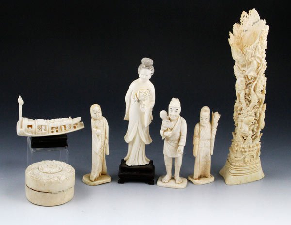 Chinese Carved Ivory Pieces: Lot of seven ivory pieces, China, to include a carved vase, four figures, one carved boat and one carved pill box, largest 9 1/2". Damage to lip of lid of box.