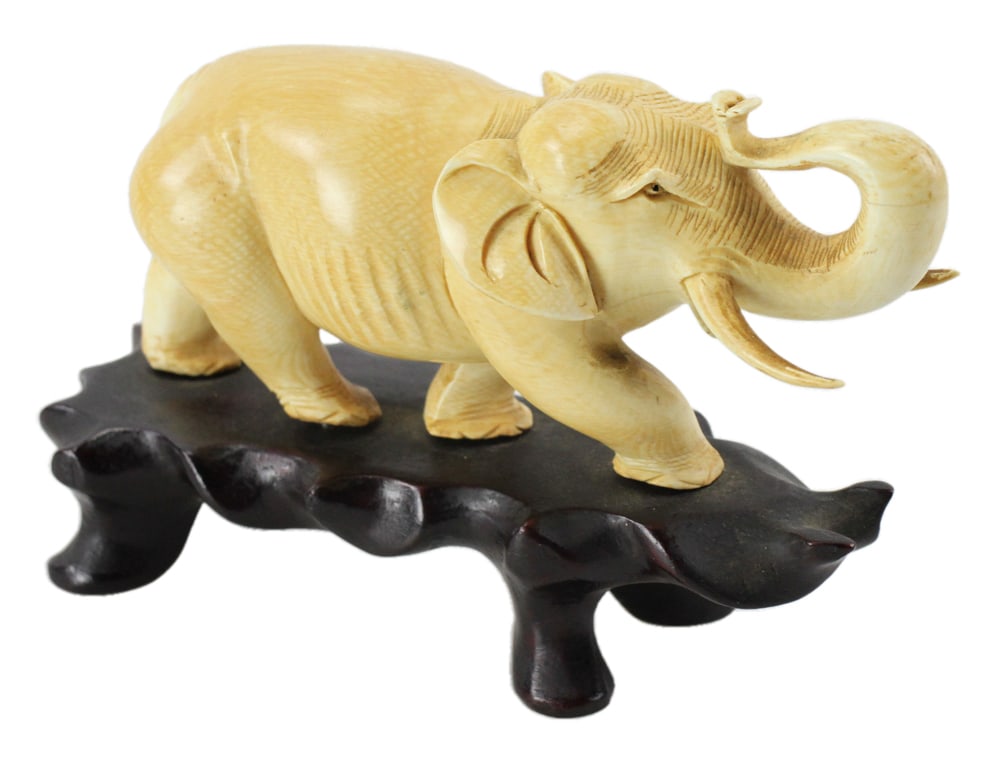 Antique Carved Bone Figure of an Elephant: Antique carved bone figure of an elephant, 4" H x 6" W. Provenance: Palm Beach, Florida estate.
