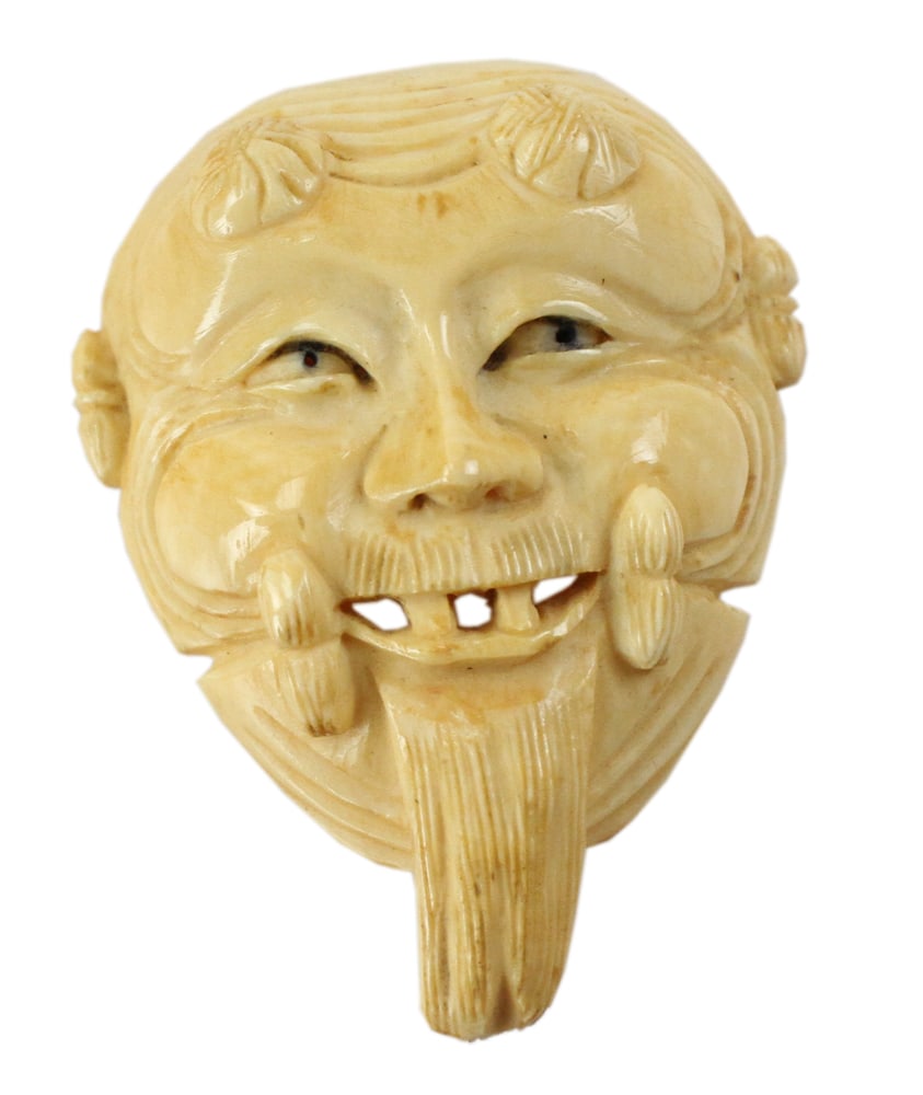 Antique Signed Carved Netsuke of a Man's Face: Antique signed carved netsuke of a man's face. Provenance: Palm Beach, Florida estate.