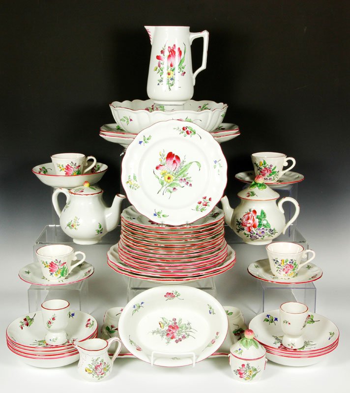 French K G Luneville Dinnerware: Partial set of French K G Luneville demi-porcelain dinnerware, to include: two platters, 12"; platter, 13 3/8" x 10 3/8"; serving bowl, 12"; serving bowl, 9 3/8" x 7 1/4"w; four plates, 10 1/2"; nine 