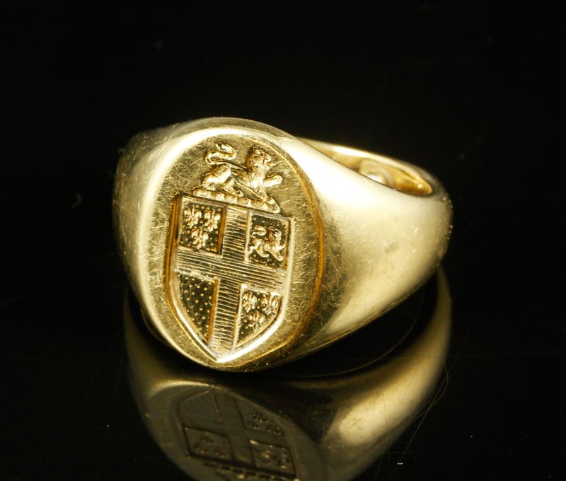 18K Gold Tiffany & Co. Signet Ring: 18K yellow gold signet ring by Tiffany and Company with insignia, size 5 1/2, with sizing balls inside of shank, approximately .5 oz/9 DWT TW.