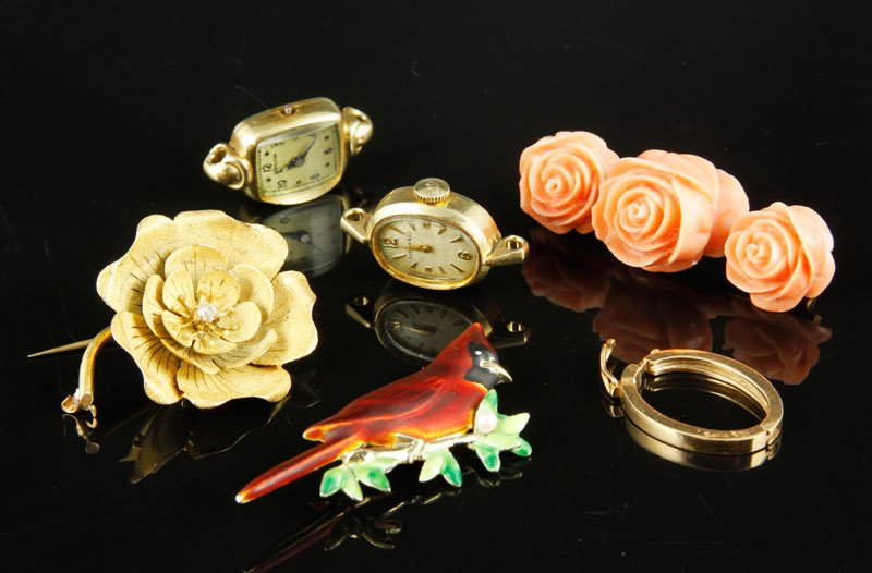 Lot of 14K Yellow Gold Items: Lot of miscellaneous 14K yellow gold to include: single oval clip, enameled "cardinal" pin with seed pearl, floral pin with diamond, ladies Tiffany and Co. by Movado, approximately .8 oz/14 DWT TW (ex