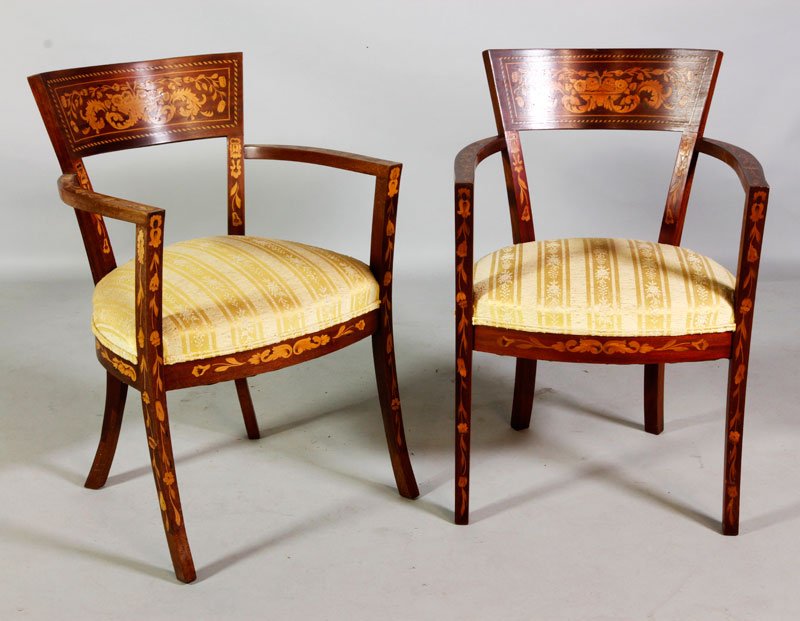 Pair 19th C. Marquetry Armchairs: Pair of 19th century armchairs, marquetry inlaid mahogany, 31 1/2"h, 17"h (seat) x 20 1/2"w x 22"d. One chair has some sun fading. Provenance: Dr. Paul and Ann Gardner New of Marblehead, MA were world