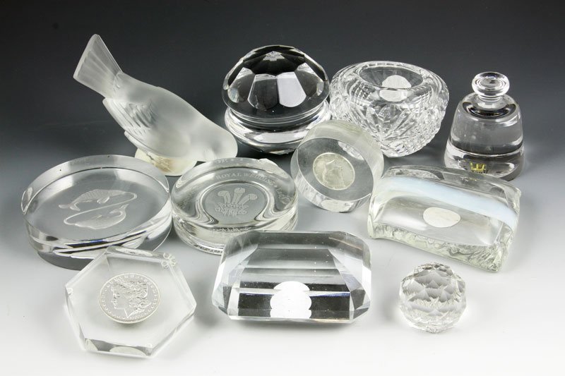 Lot of 11 Paperweights: Lot of nine crystal and two Lucite paperweights to include: one labeled golden crown (West Germany), one signed Kosta Sinnemark, one signed Jaly Lambert, one etched Waterford, 1981 Royal Wedding (Char