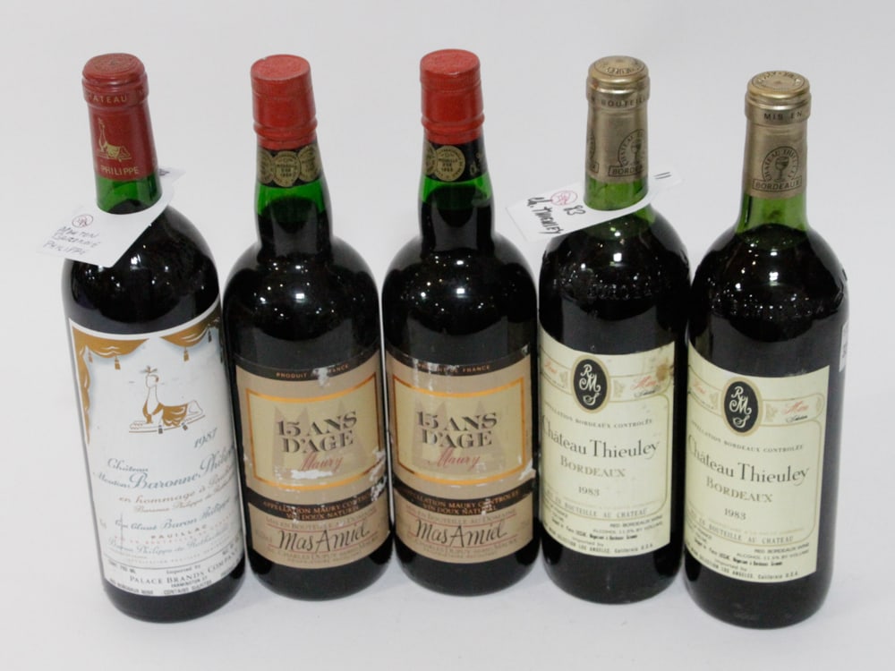 Assorted Fine Wine: (5) 750ml bottles, to include: (2) Chateau Thieuley Bordeaux, 1983; (2) Mas Amiel 15 Ans d'Age Maury; (1) Chateau Mouton Baronne Philippe Pauillac, 1987.