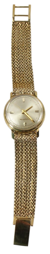 14k Yellow Gold Men's Bulova Accutron Watch: 14k yellow gold men's Bulova Accutron wrist watch with 14k band. Includes original box and paperwork. 7 3/4" L, 6 1/4" diameter face. Approximately 69.30 grams TW. PLEASE NOTE: payment for silver, gol