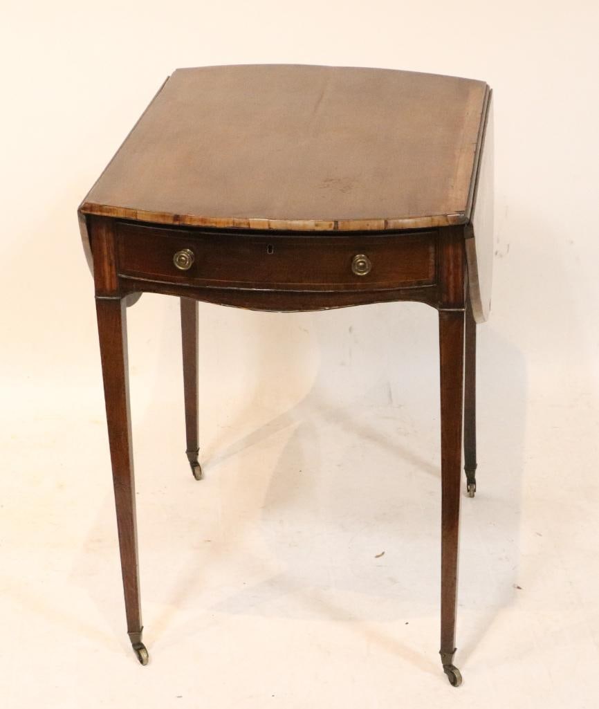 18thC English Hepplewhite Pembroke Table: 18th century English Hepplewhite Pembroke drop-leaf table having fine inlay and brass casters, 27" H x 28" W x 39" L.