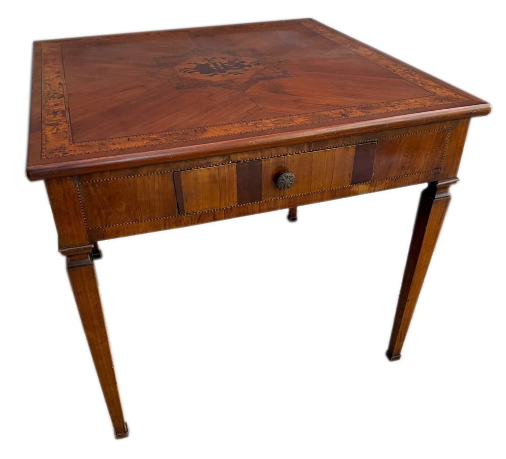 18th/19thC Swedish Neoclassical Games Table: 18th/19th century Swedish Neoclassical games table having inlaid flutes in center of table, 29" H x 33" W x 33" D. Provenance: Mitchell-Armour Estate.