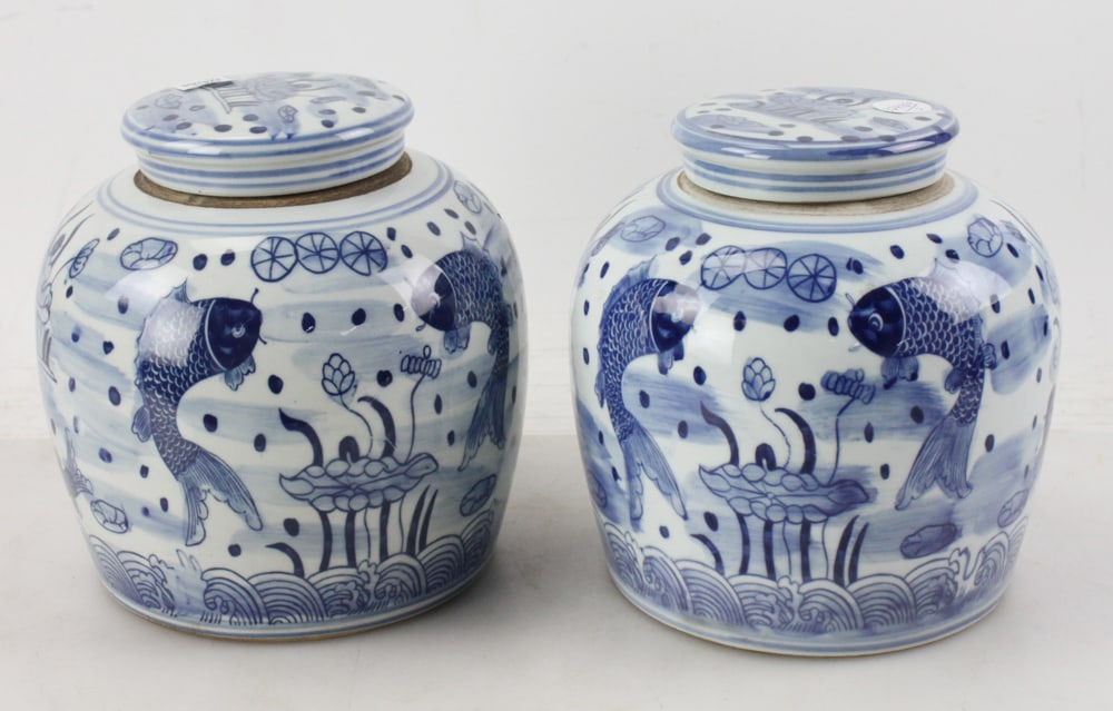 Pair of Chinese Koi Fish Ginger Jars: Pair of Chinese koi fish ginger jars, 9" x 8 1/2".